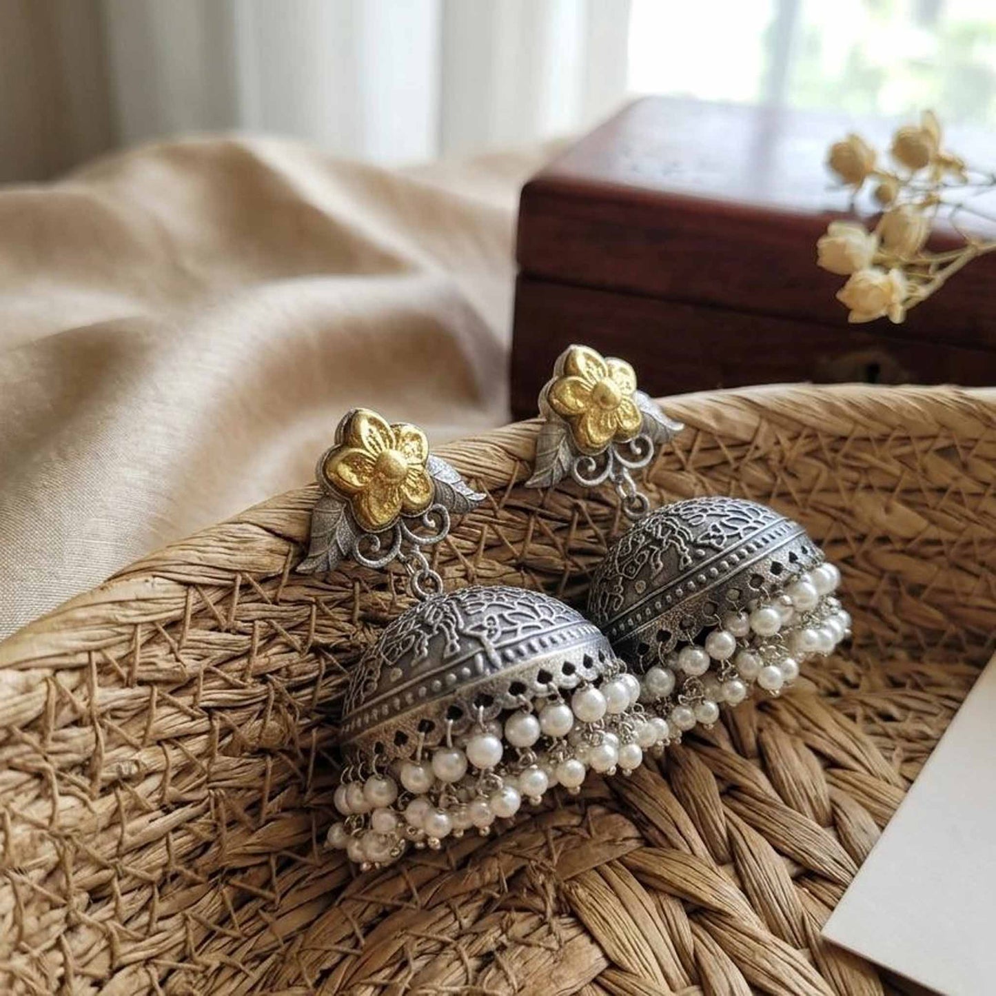 Traditional German Silver floral jhumka earrings in woven basket styling