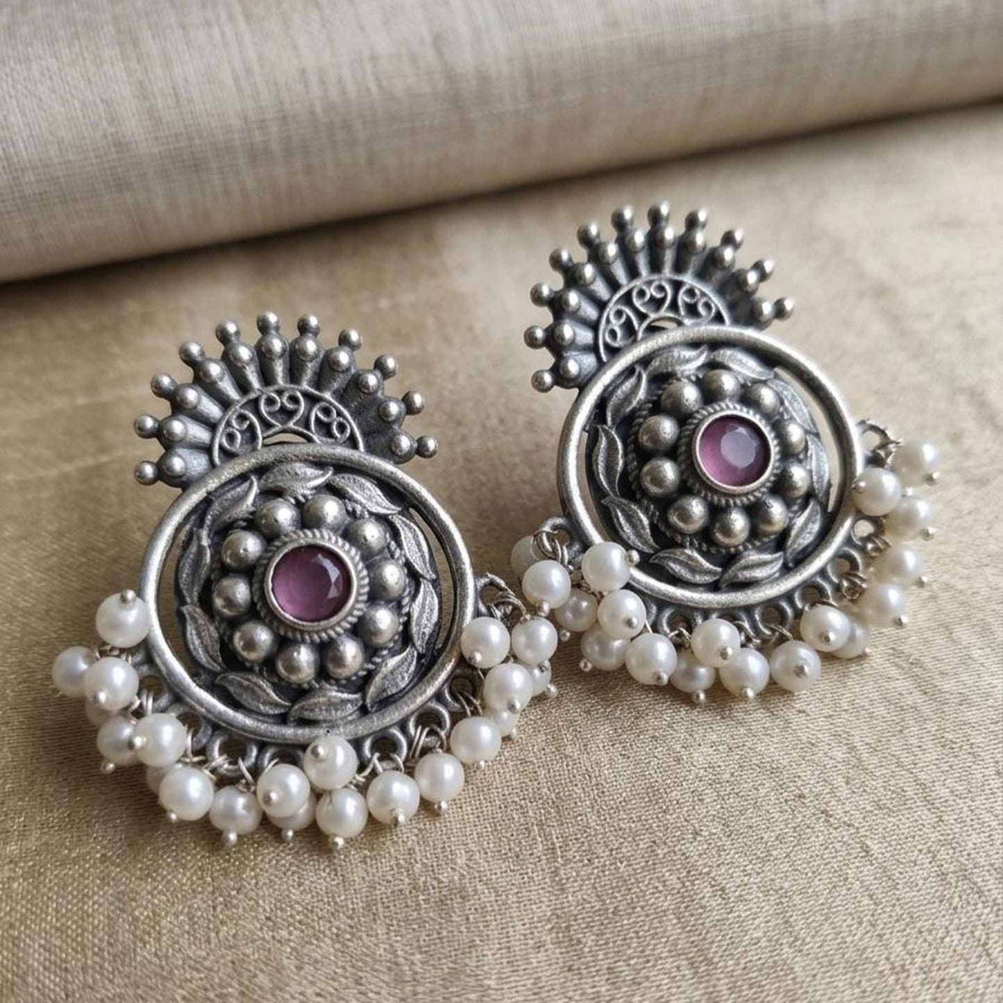 Detailed closeup of pearl German Silver chandbali earrings
