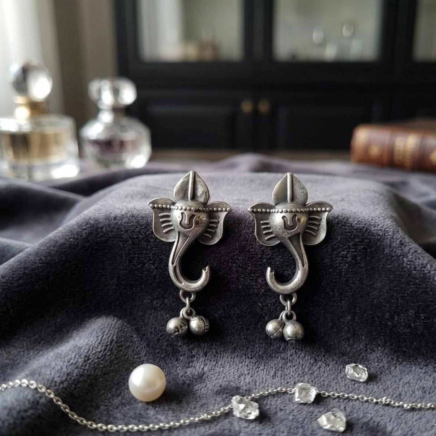 Ganesha ghungroo German silver earrings front styling view