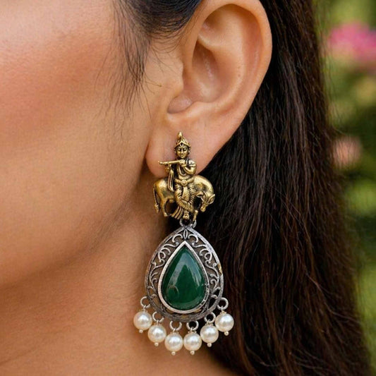 Side closeup of Krishna emerald pearl earrings