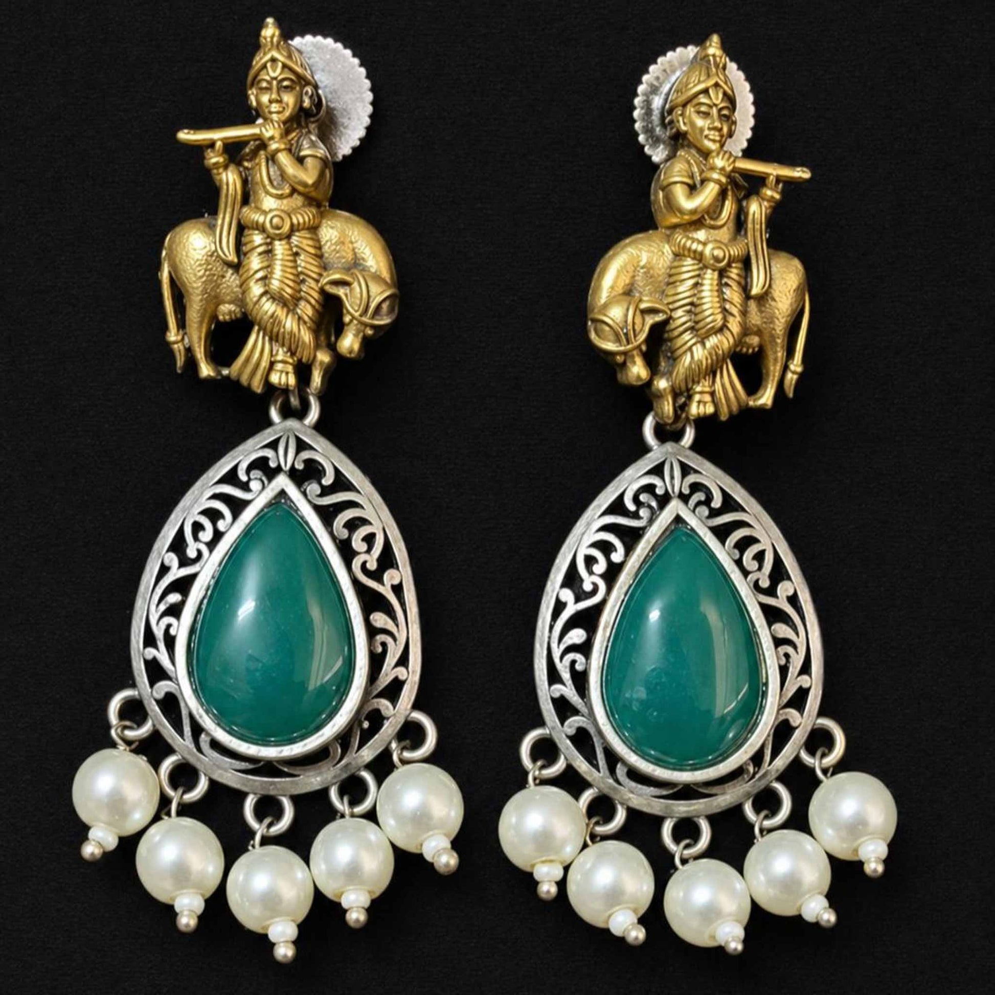 Black background product image of Krishna emerald pearl earrings
