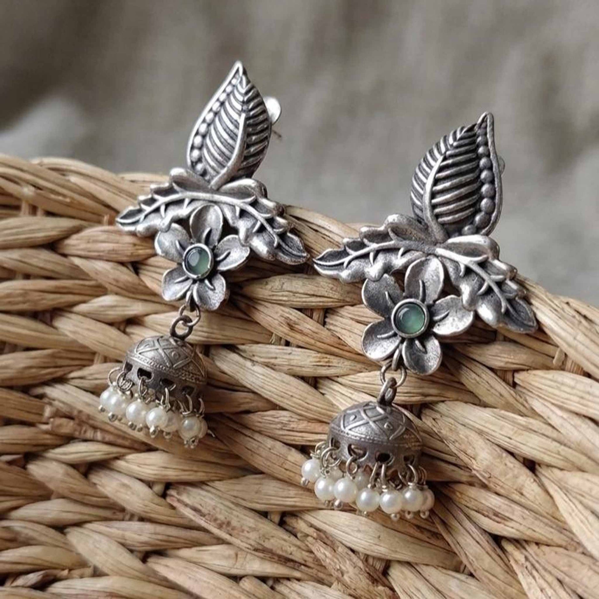 Woven basket styled floral leaf pearl ghumki earrings