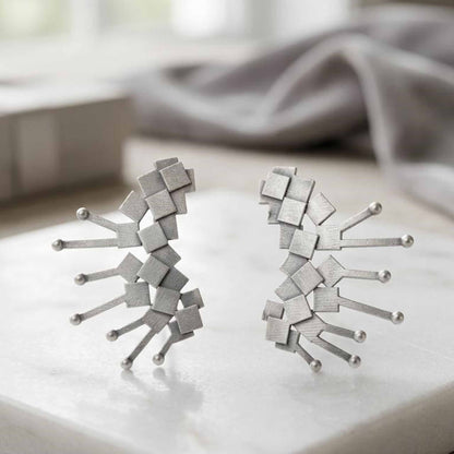 Modern geometry earrings flatlay
