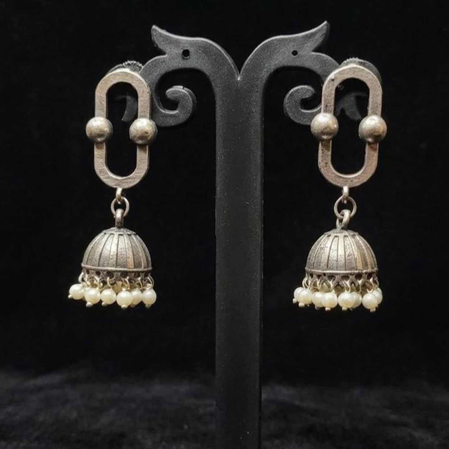 Oval Border Pearl Jhumki Earrings display stand view