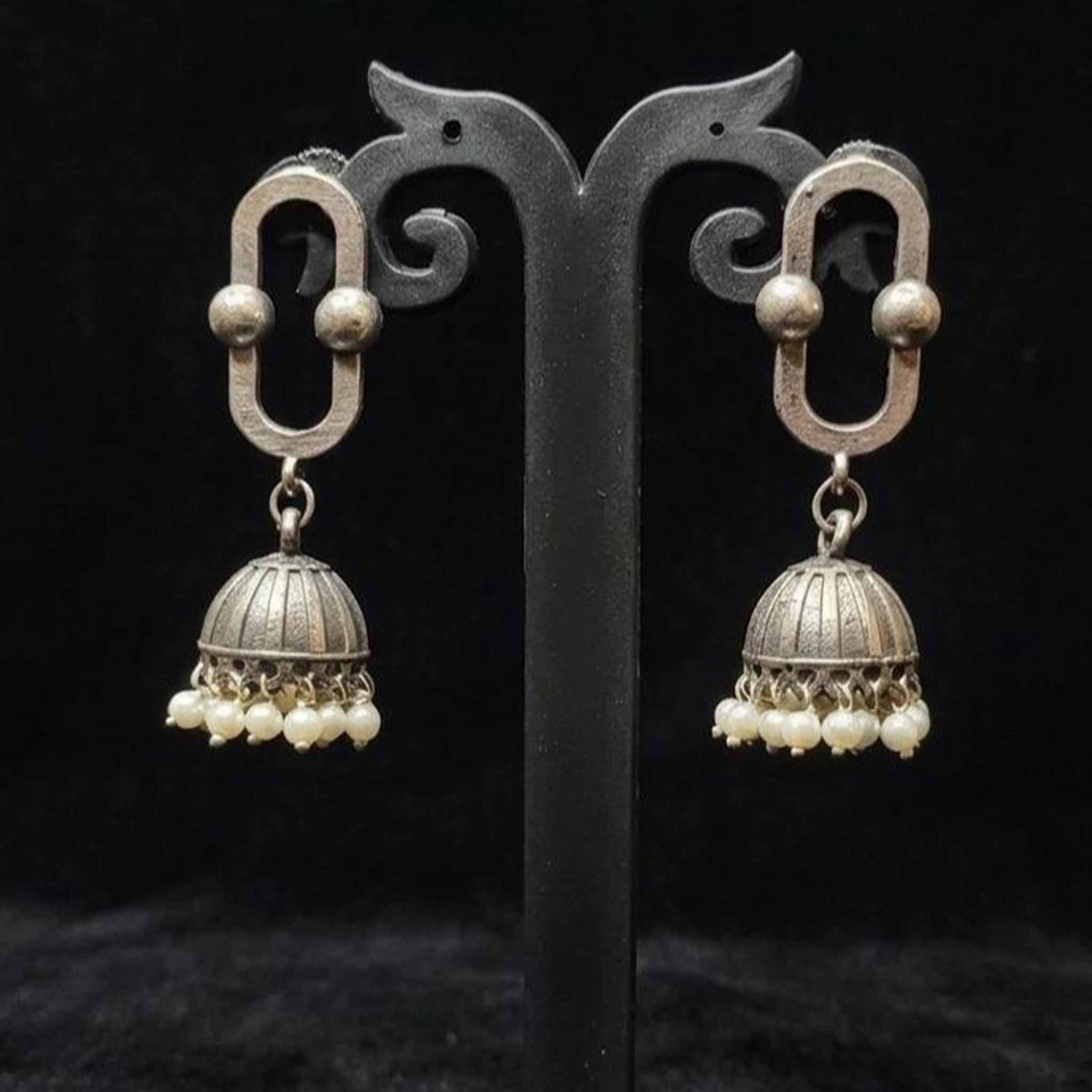 Oval Border Pearl Jhumki Earrings display stand view