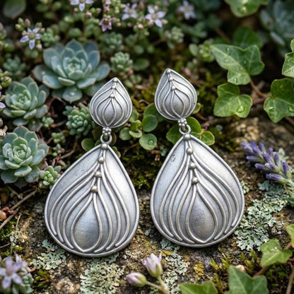 Lotus inspired German silver statement earrings front view