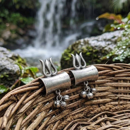 Trishul damru German Silver earrings with nature backdrop