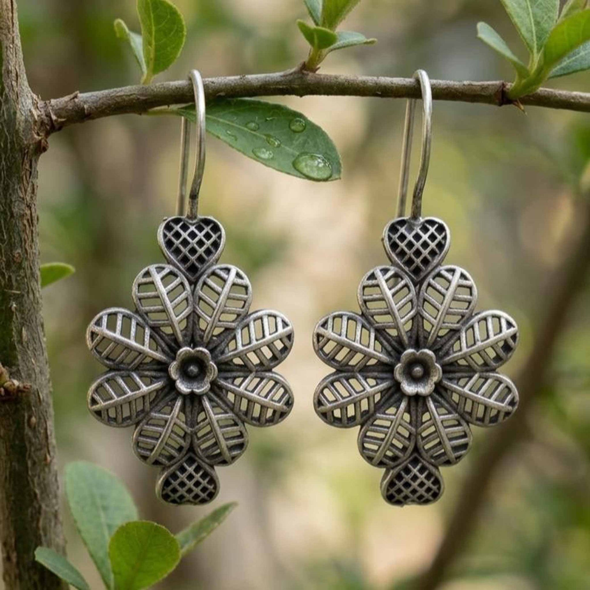 Nature styled German Silver floral heart earrings