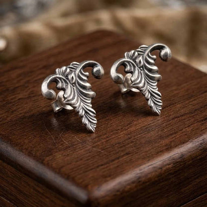 Elegant vine leaf stud earrings product display