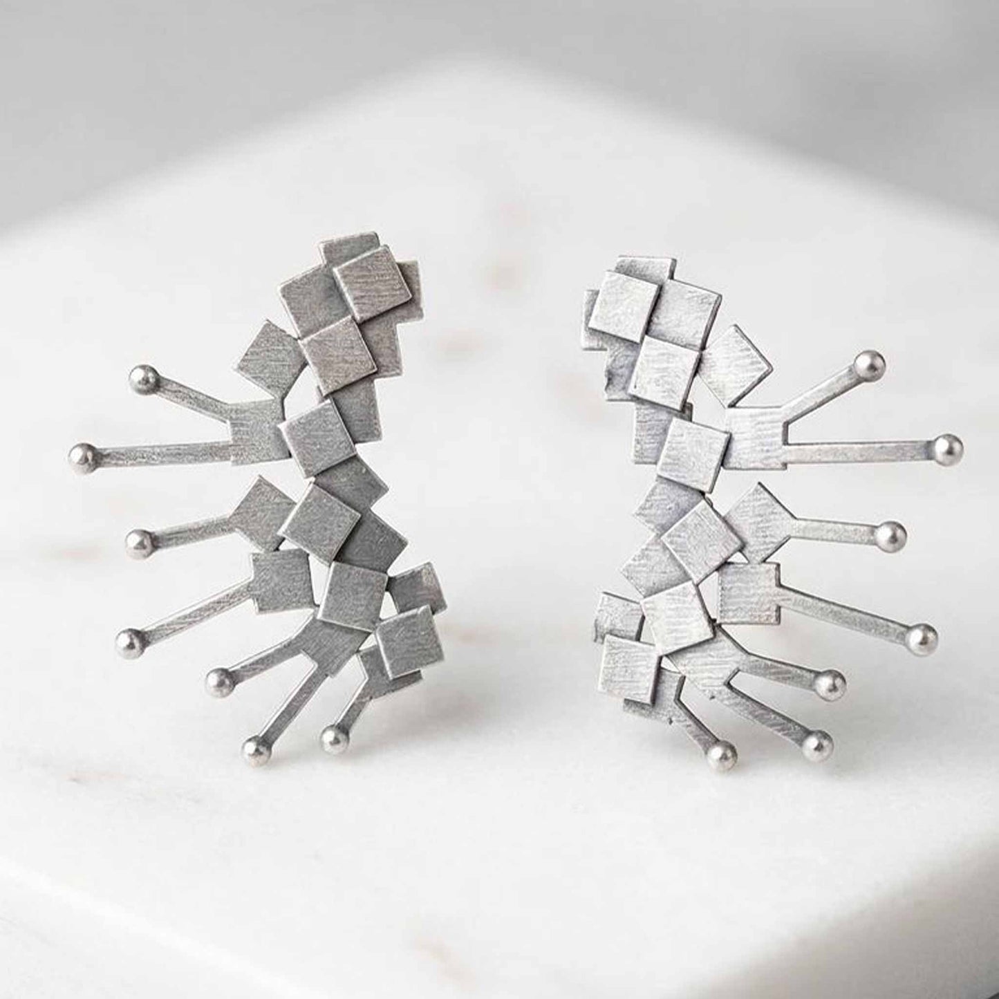 Minimalist geometric silver statement earrings