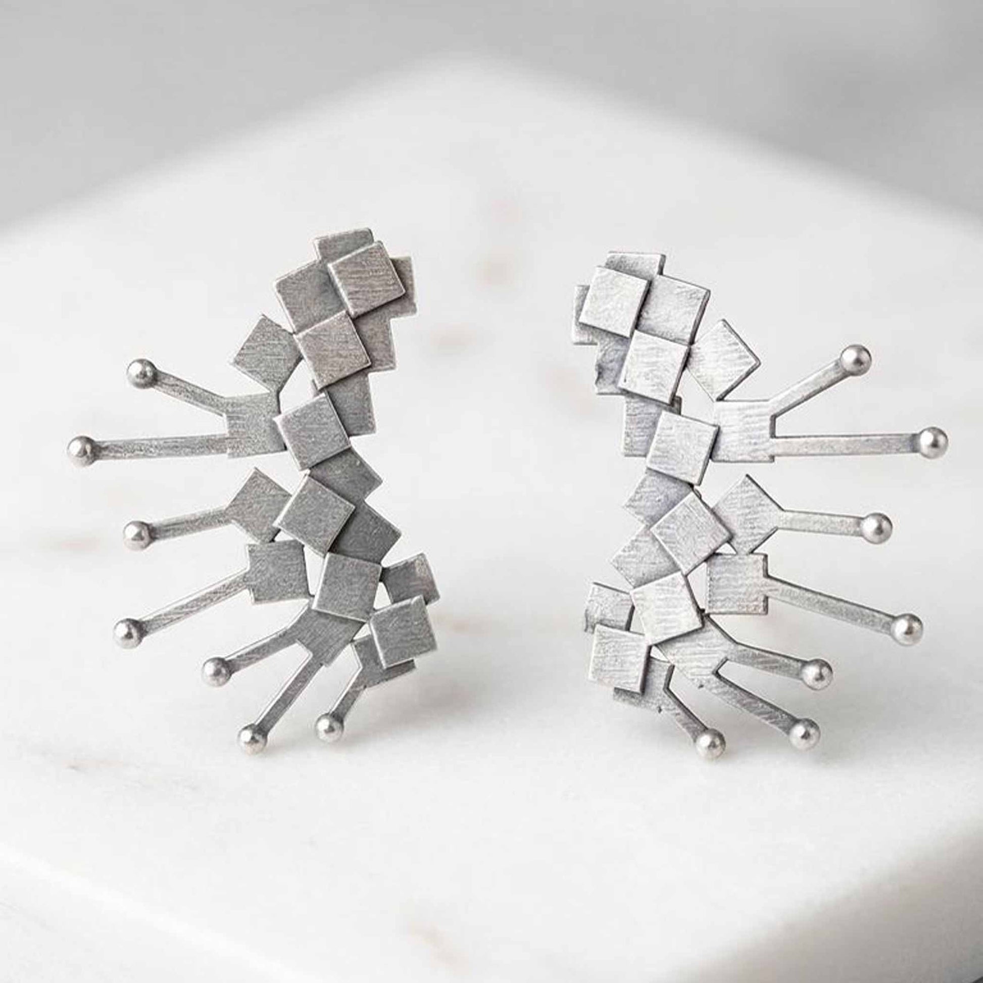 Minimalist geometric silver statement earrings