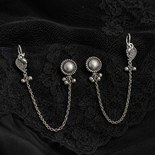 German Silver ear chain earrings on black lace fabric