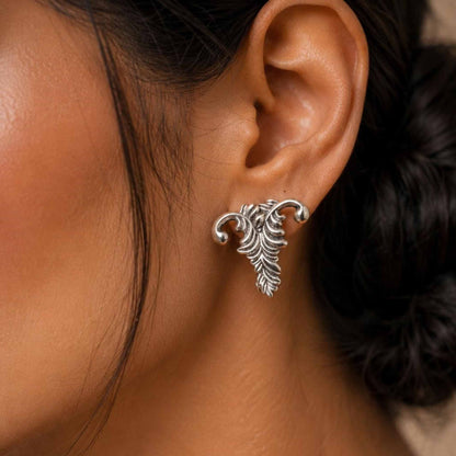 Closeup ear styling with antique silver leaf studs