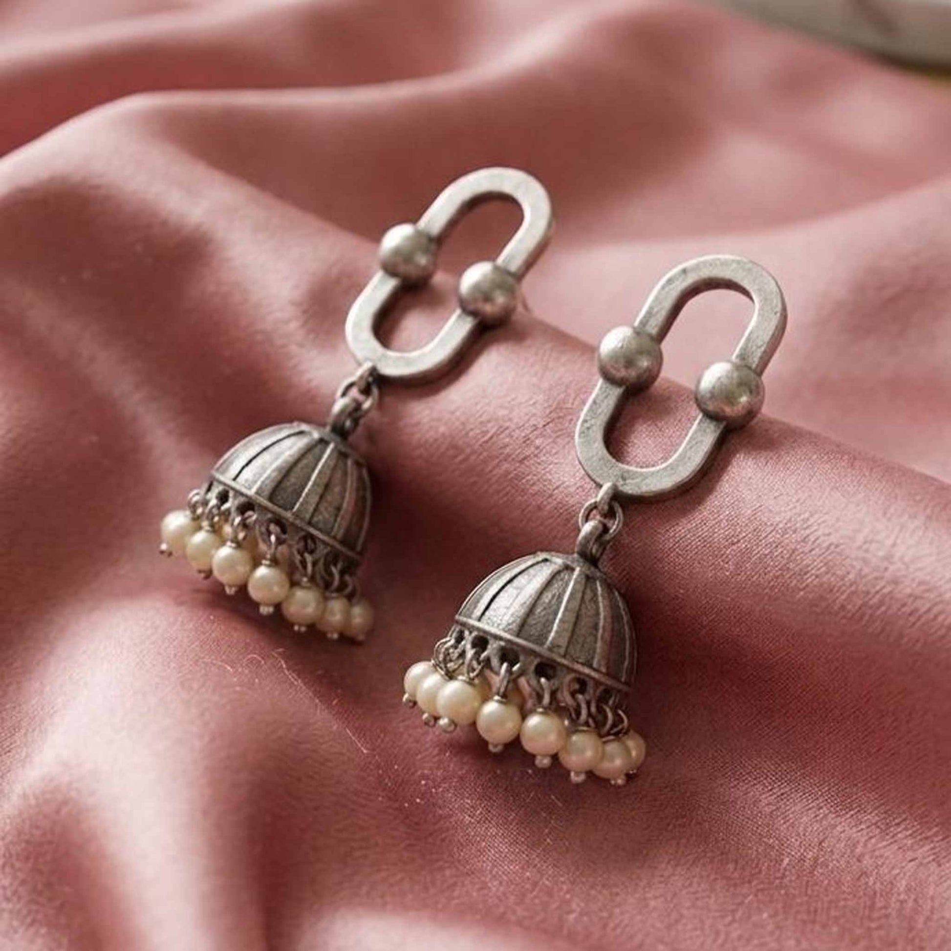 Oval Border Pearl Jhumki Earrings close up view