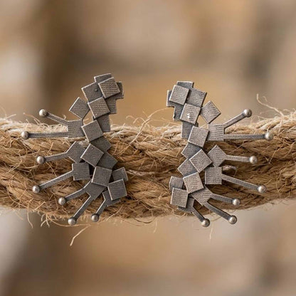 Abstract ear cuff earrings on rope styling