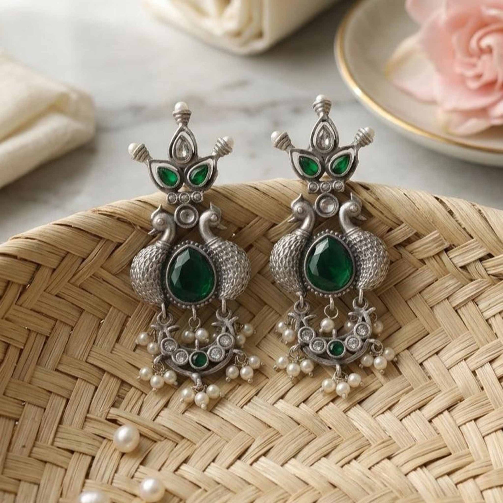 Peacock emerald earrings basket styling