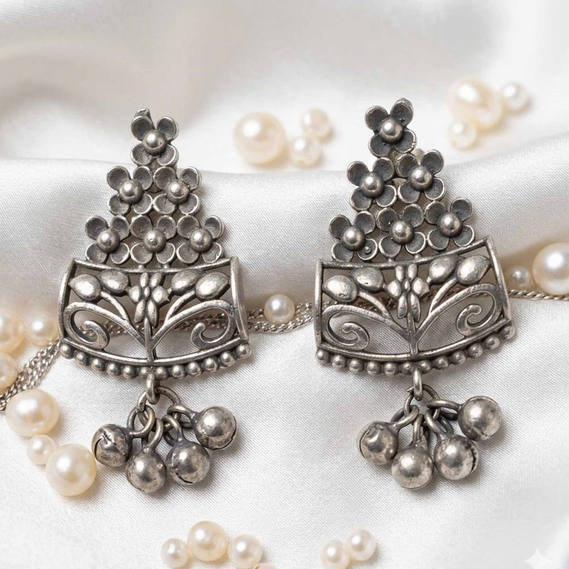 Floral ghungroo German silver earrings with pearl styling