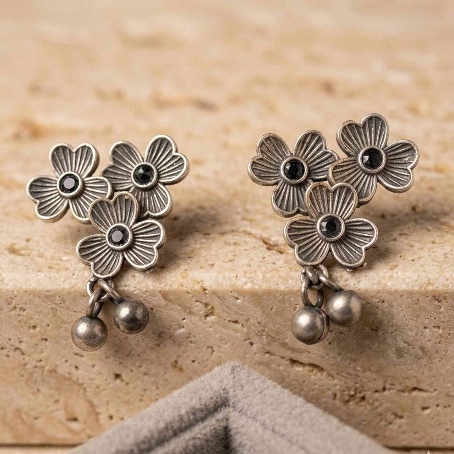 Three flower floral German silver earrings product display