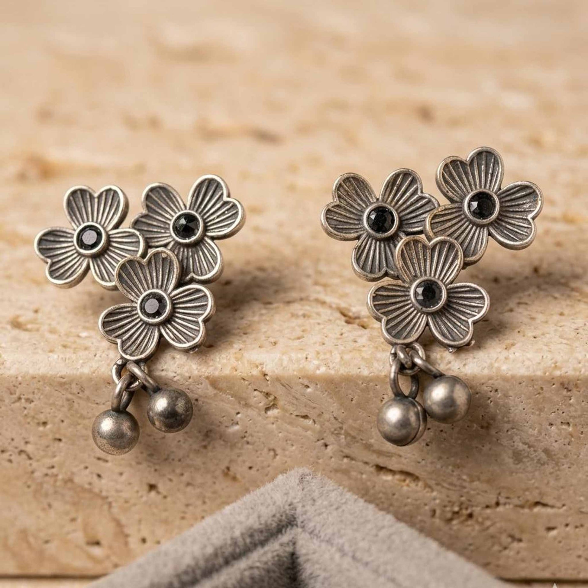 Three flower floral German silver earrings product display
