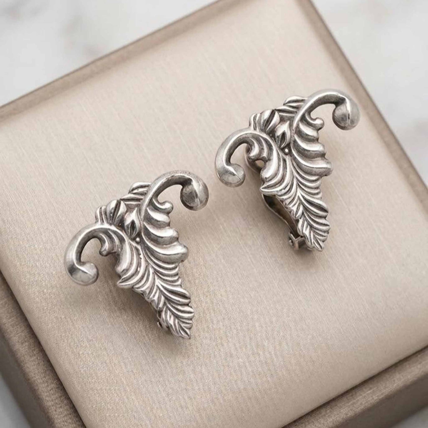 Abstract vine leaf stud earrings in antique silver finish