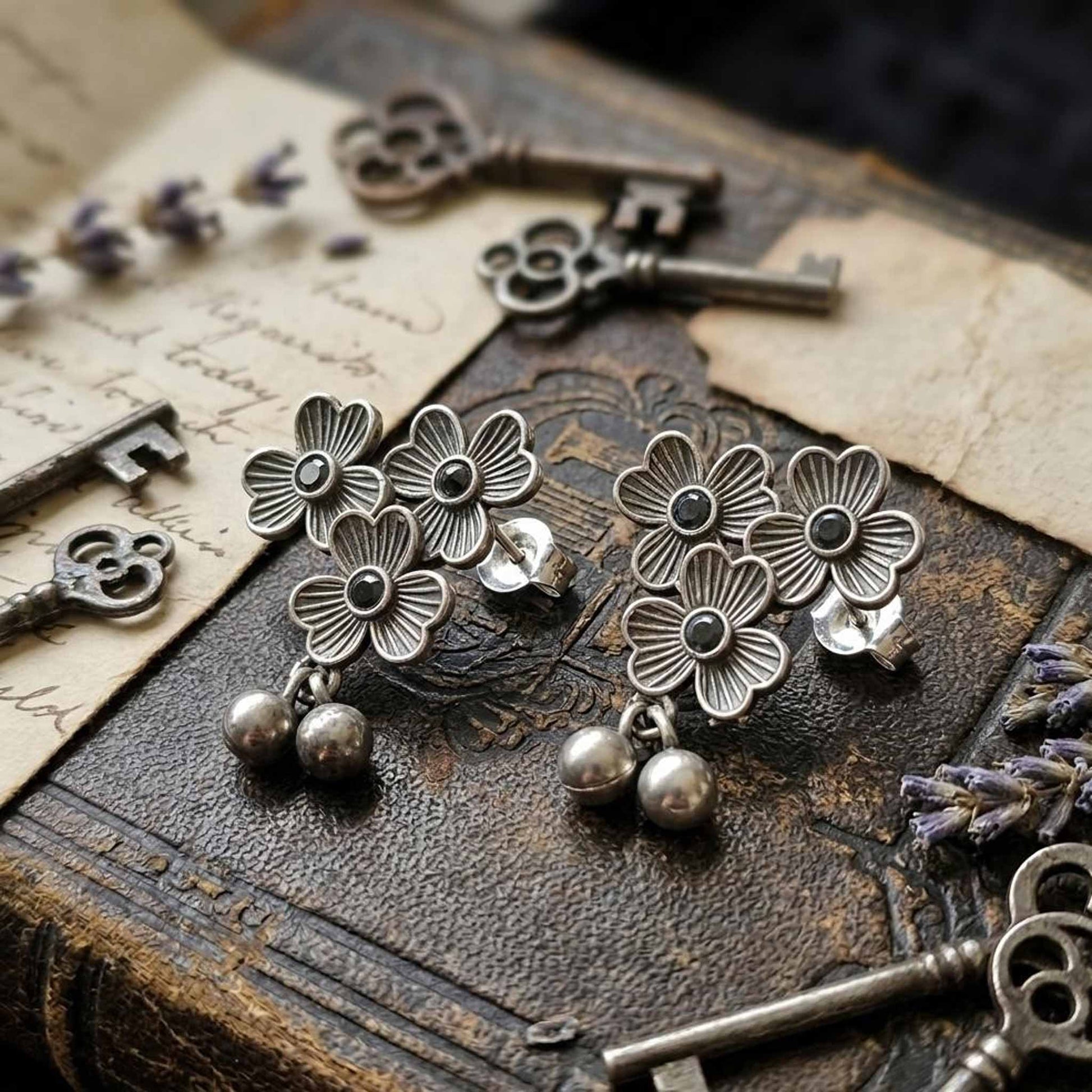 Vintage style three flower German silver earrings closeup
