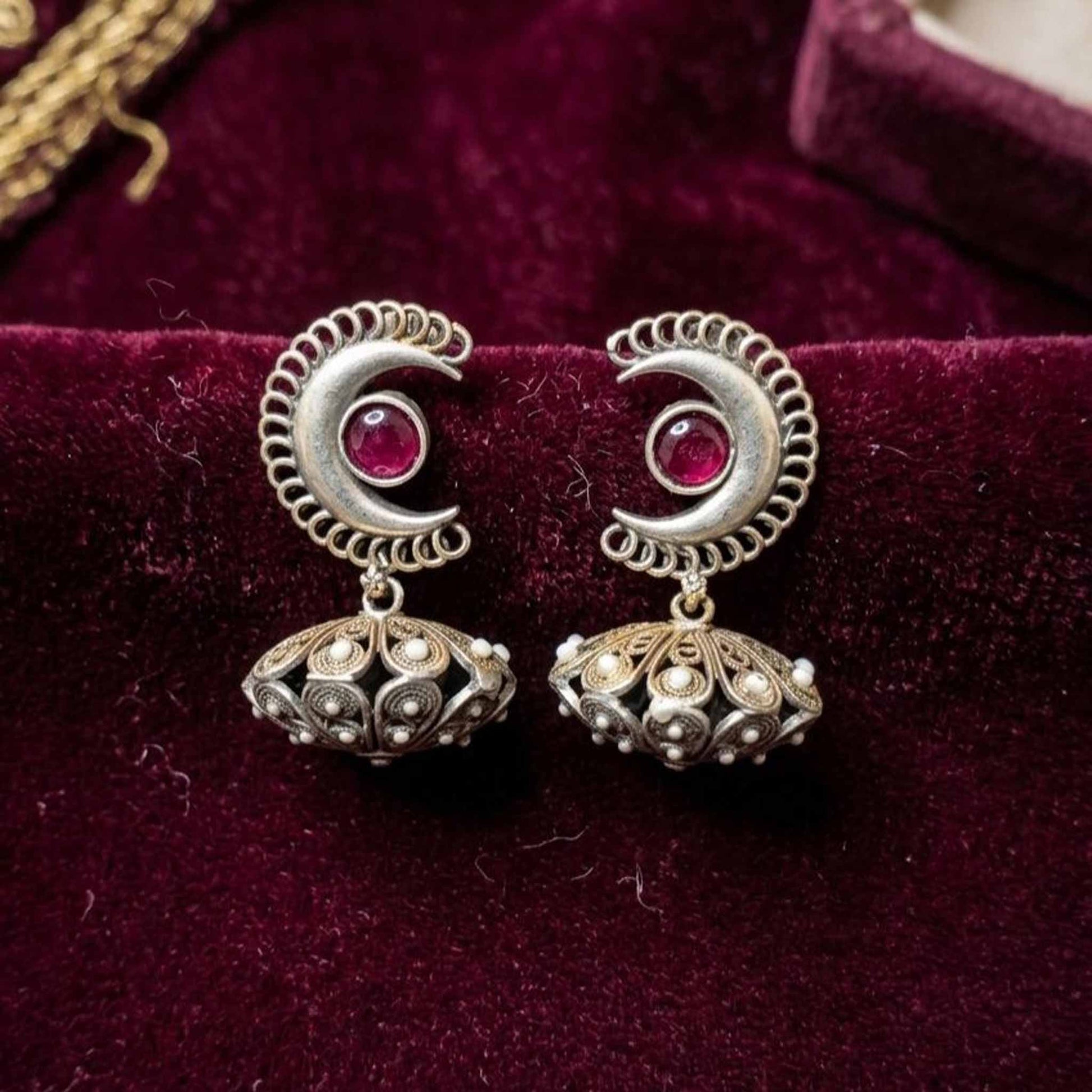 Moonstone Basket Jhumki Earrings velvet backdrop view
