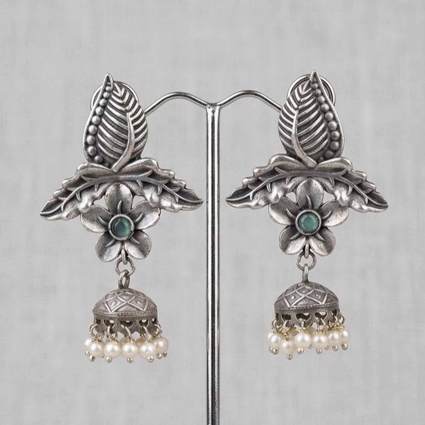 Front display of handcrafted leaf floral pearl ghumki earrings