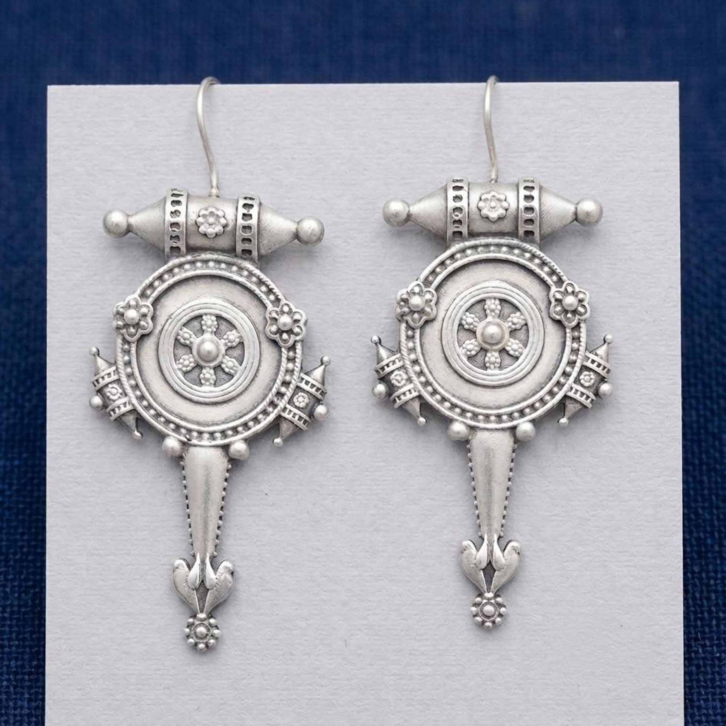 Closeup front view of handcrafted tribal hook earrings