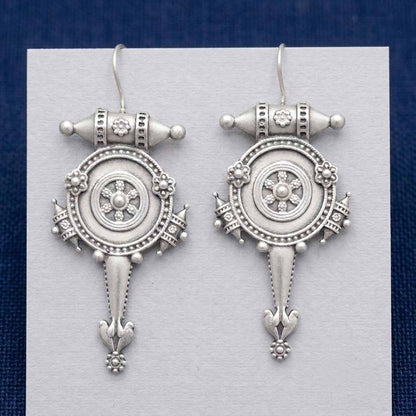 Closeup front view of handcrafted tribal hook earrings
