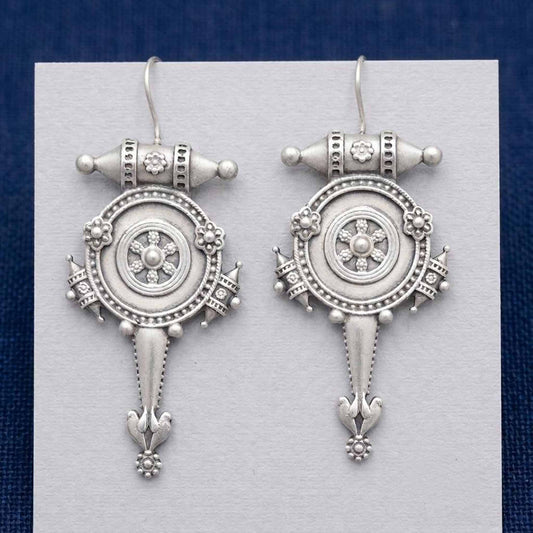 Closeup front view of handcrafted tribal hook earrings