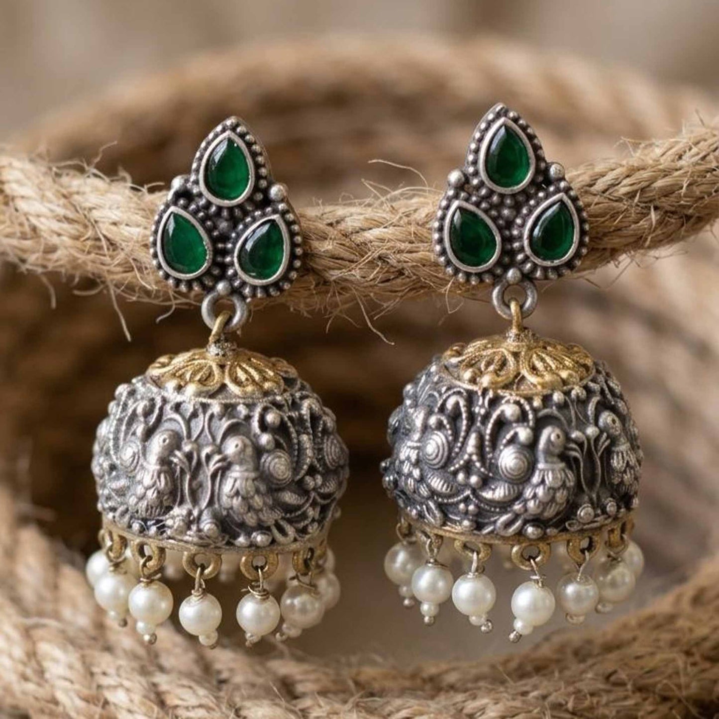 Closeup German Silver peacock jhumka earrings