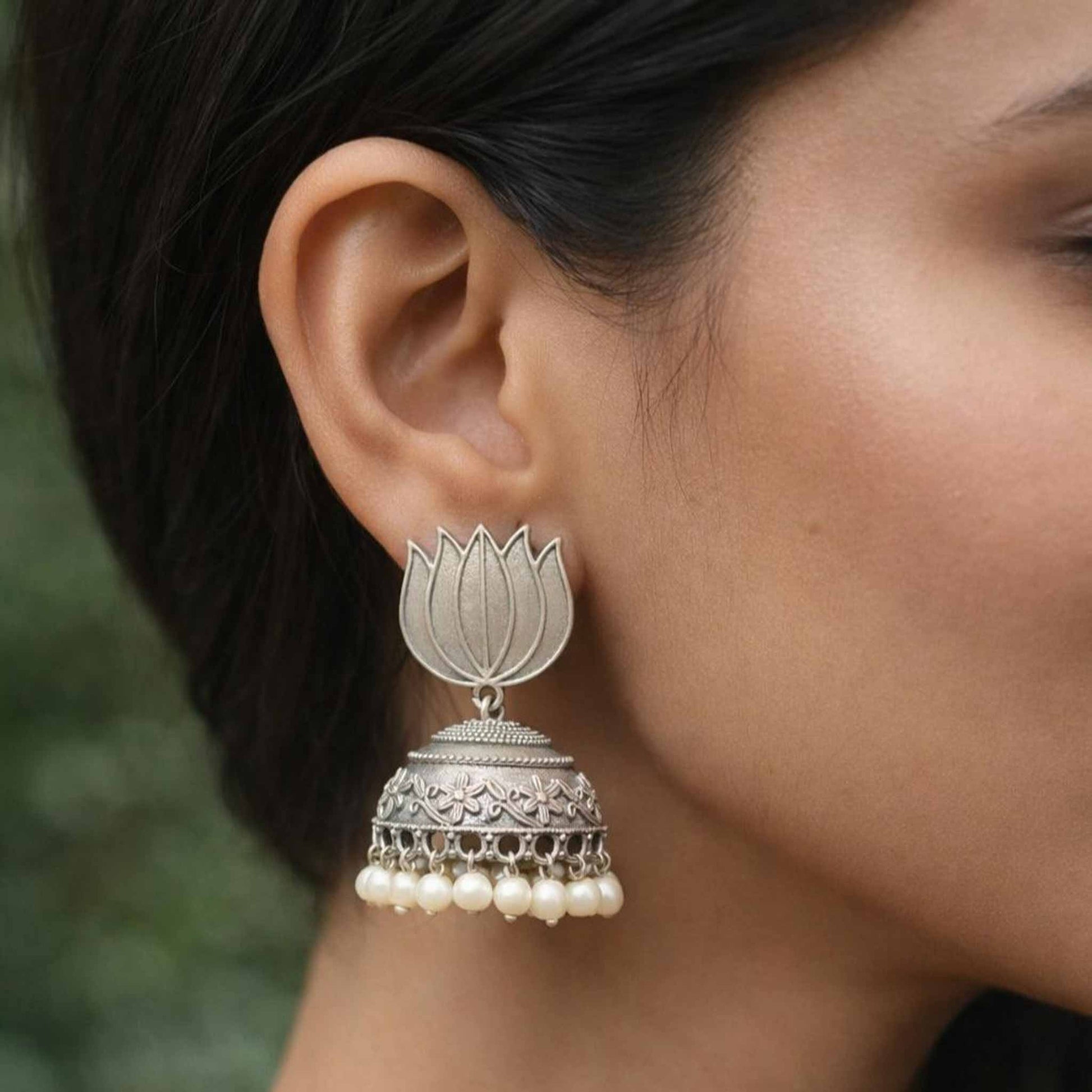 Lotus pearl jhumka earrings worn by model