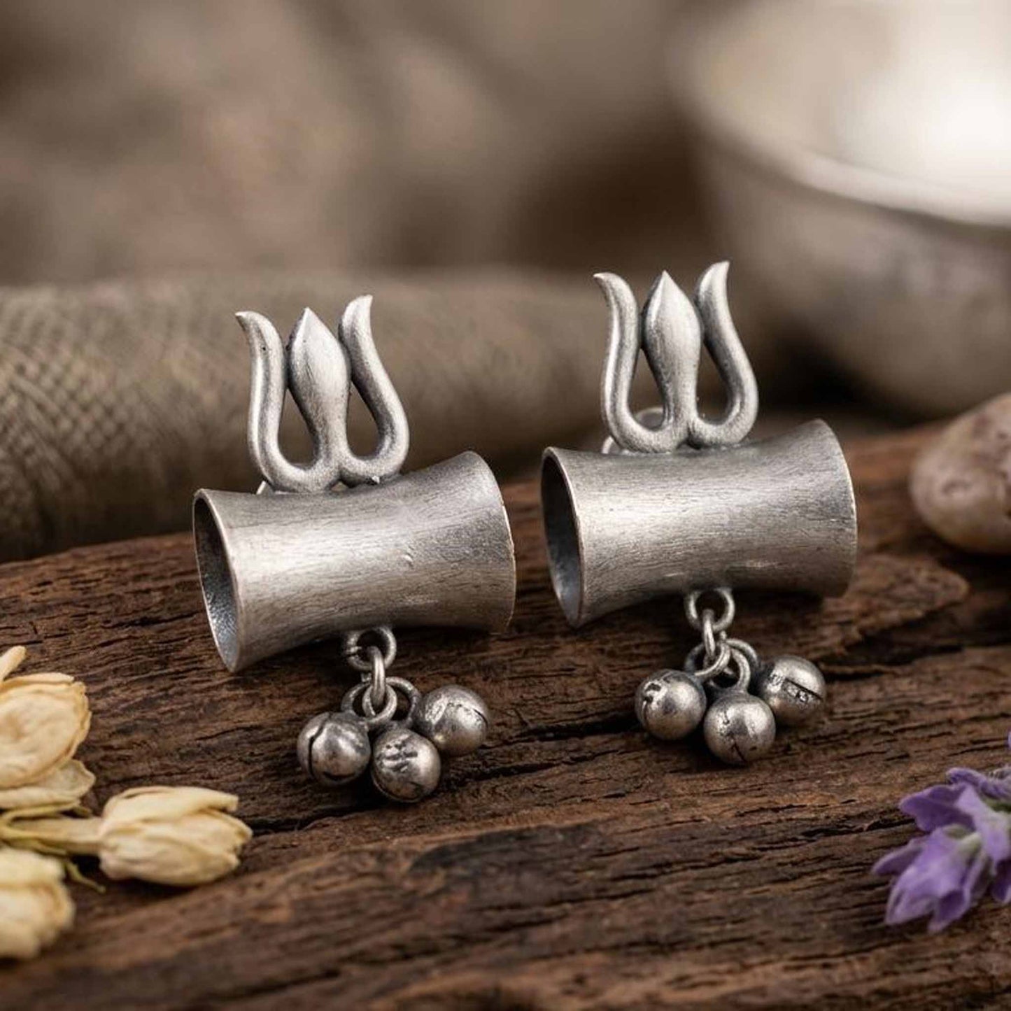 Traditional silver tone trishul earrings with ghungroo