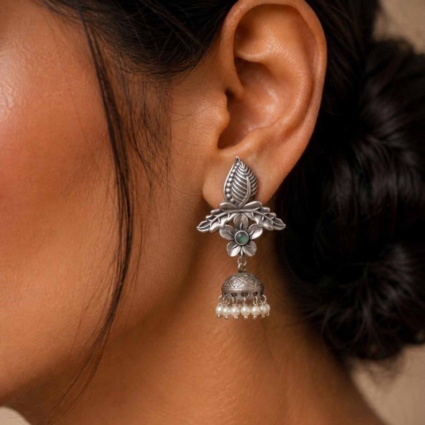 Closeup model shot of leaf floral pearl ghumki earrings
