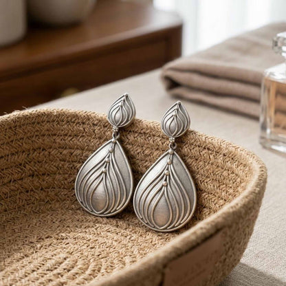 Handcrafted lotus drop earrings in woven basket styling