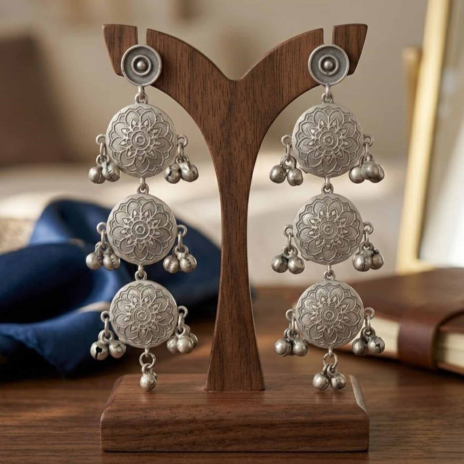 Front display of triple layer mandala ghunghroo earrings