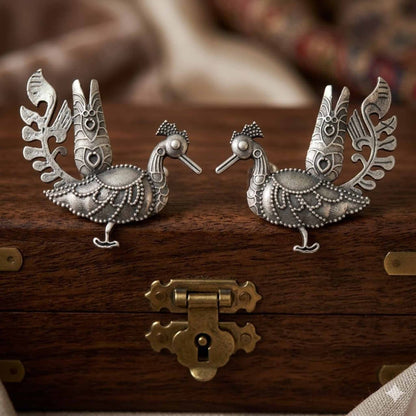 German Silver peacock statement earrings on wooden box