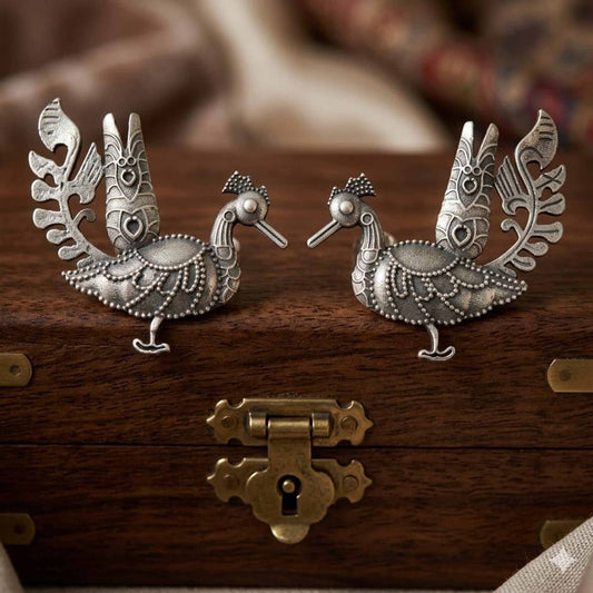 German Silver peacock statement earrings on wooden box