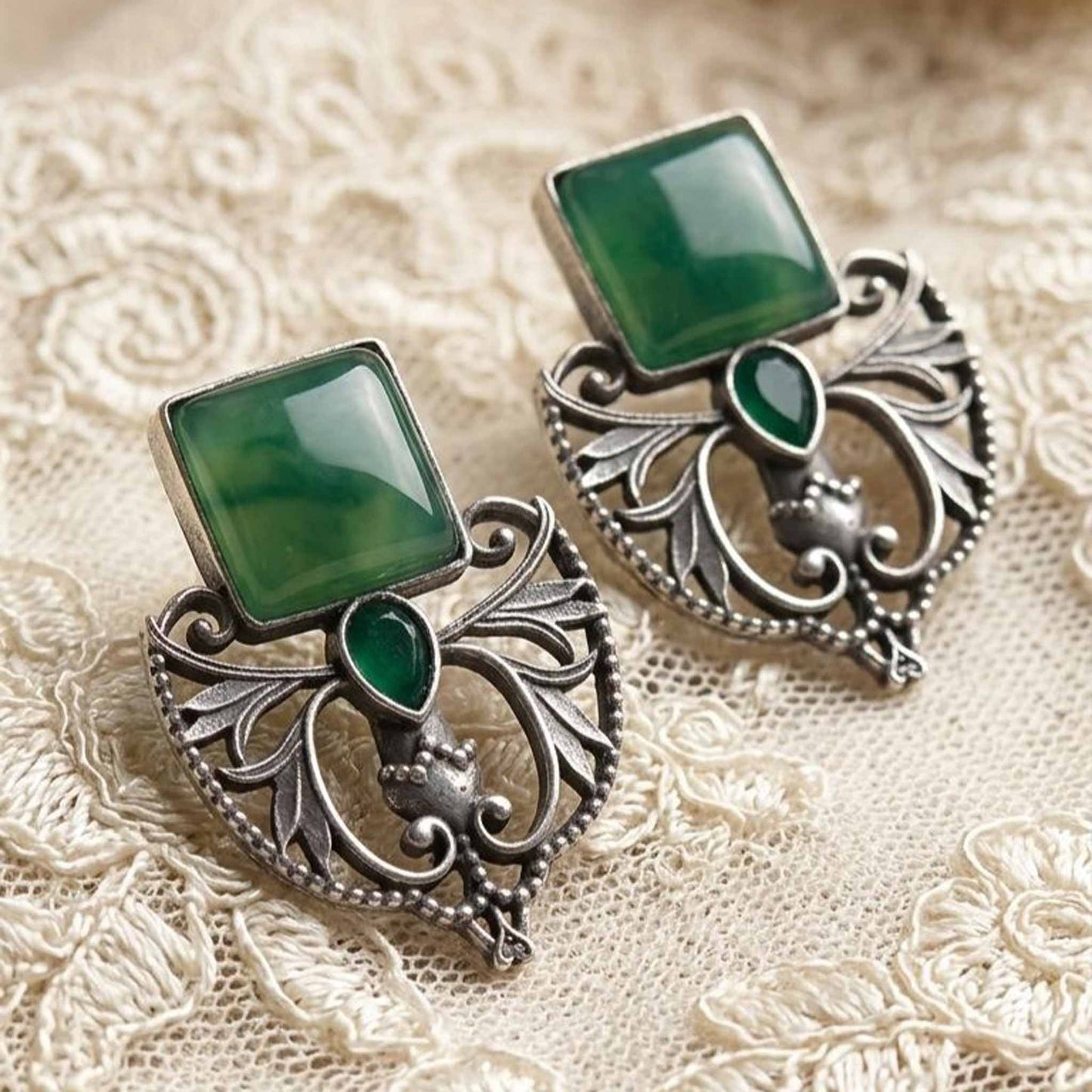Vintage green stone earrings flatlay