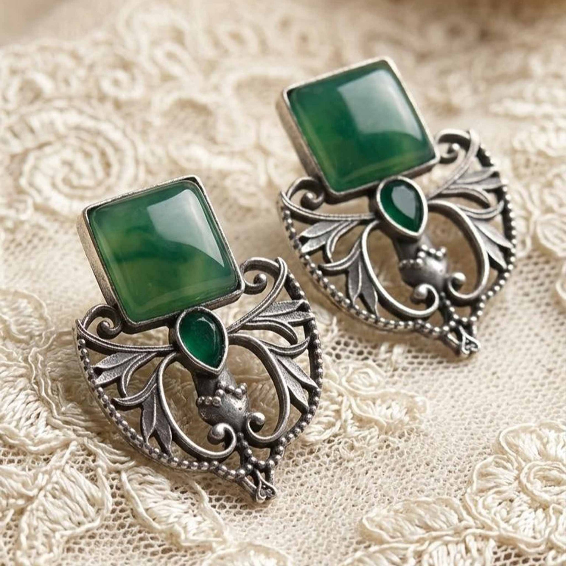 Vintage green stone earrings flatlay