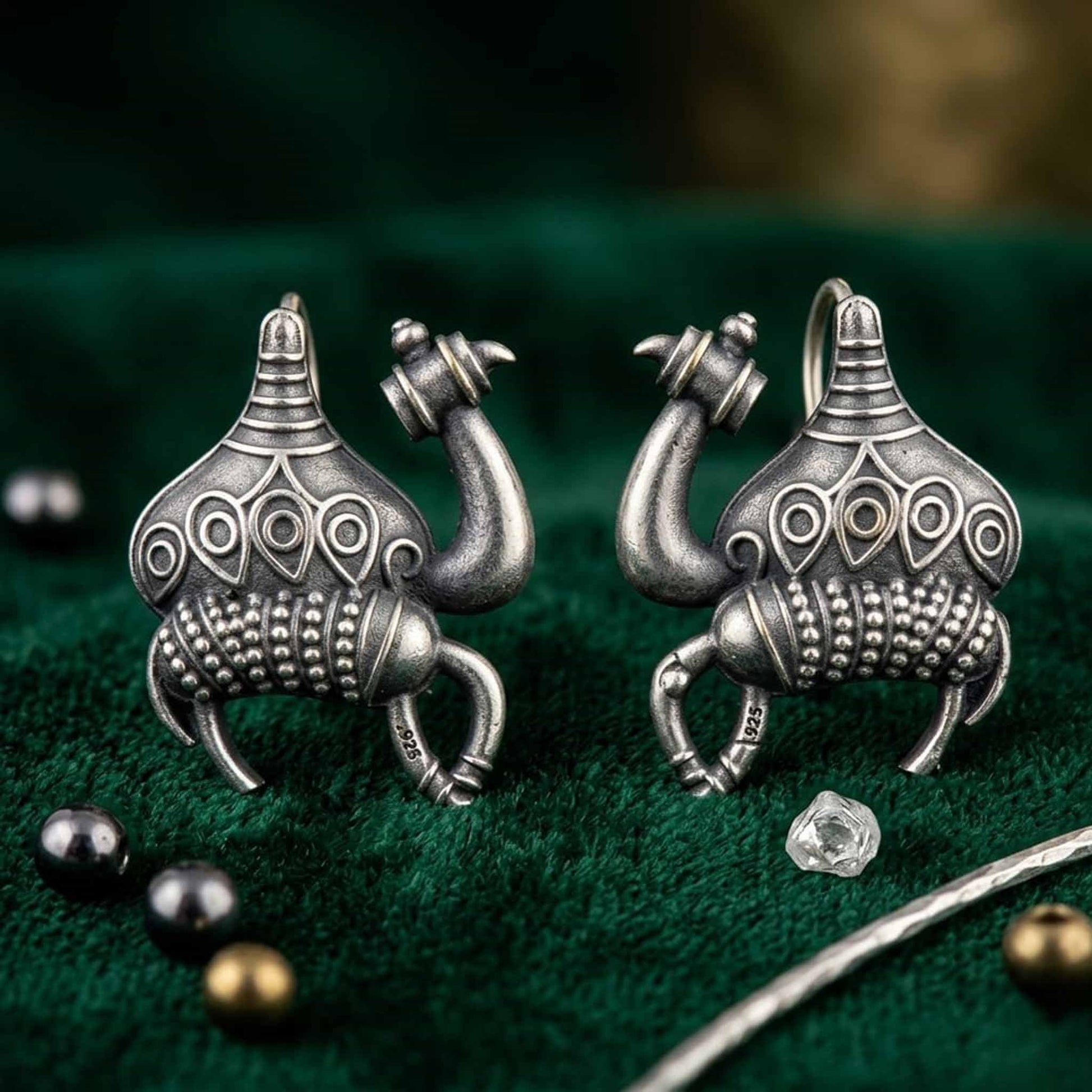 Antique finish camel motif stud earrings product showcase