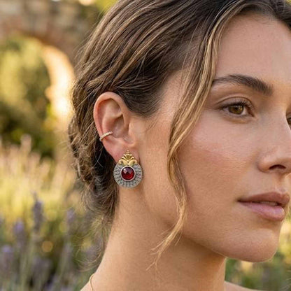 Woman wearing ruby dual tone ethnic earrings outdoors