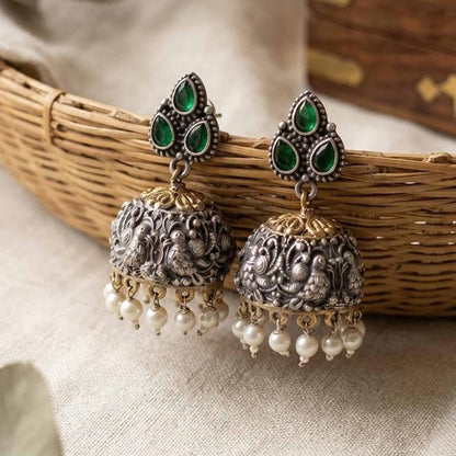 Emerald peacock embossed jhumka earrings with pearl drops