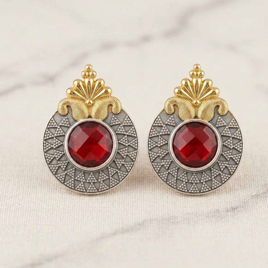 Front display of ruby dual tone statement earrings