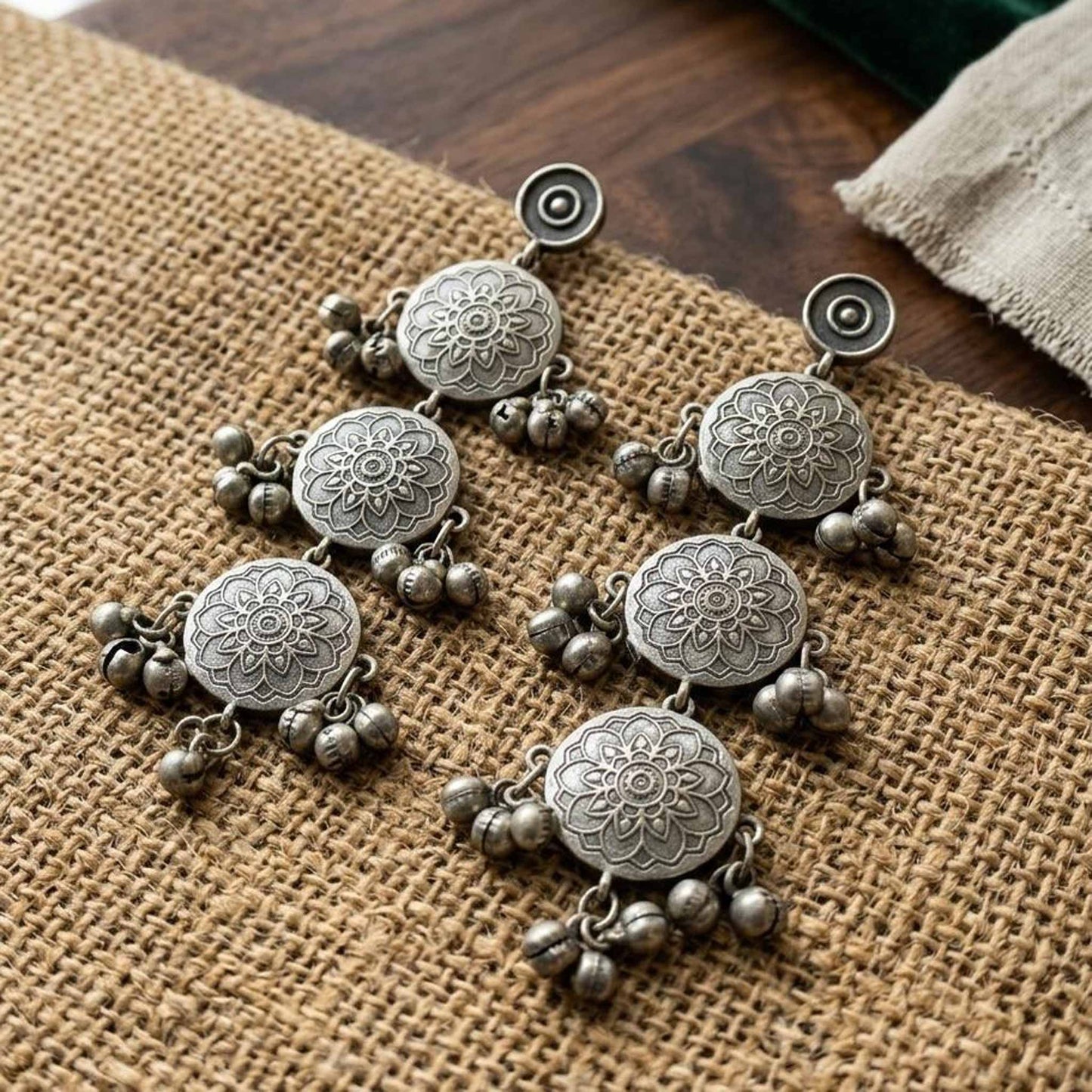 Rustic styled image of long ethnic ghunghroo earrings