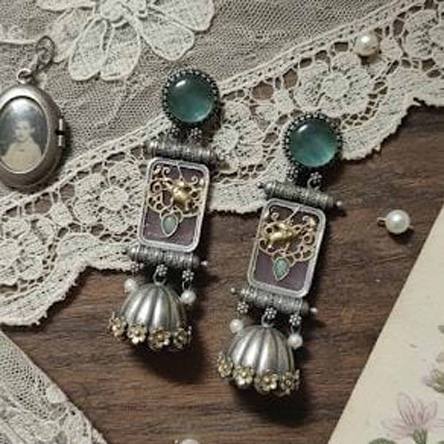Royal Elephant Motif Temple Jhumka Earrings with Green Stone