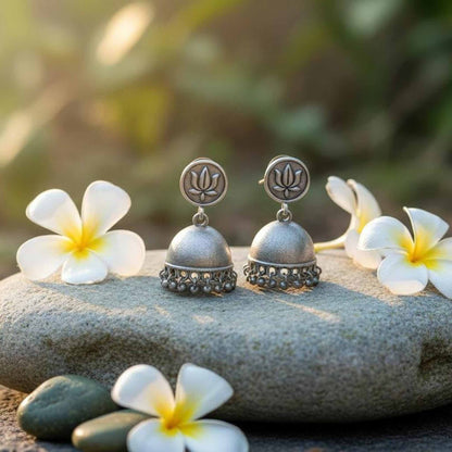 Lotus Motif German Silver Jhumka Earrings with Ghungroo Detailing