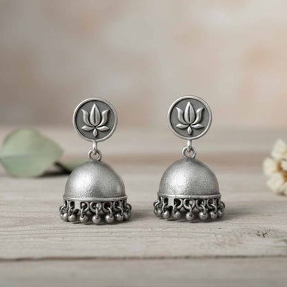 Lotus Motif German Silver Jhumka Earrings with Ghungroo Detailing