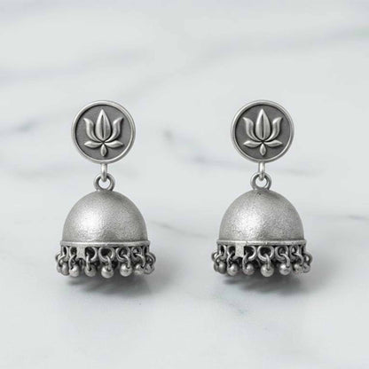 Lotus Motif German Silver Jhumka Earrings with Ghungroo Detailing